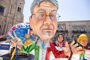 Caricatura del premier Gentiloni, realizzata in occasione del G7
